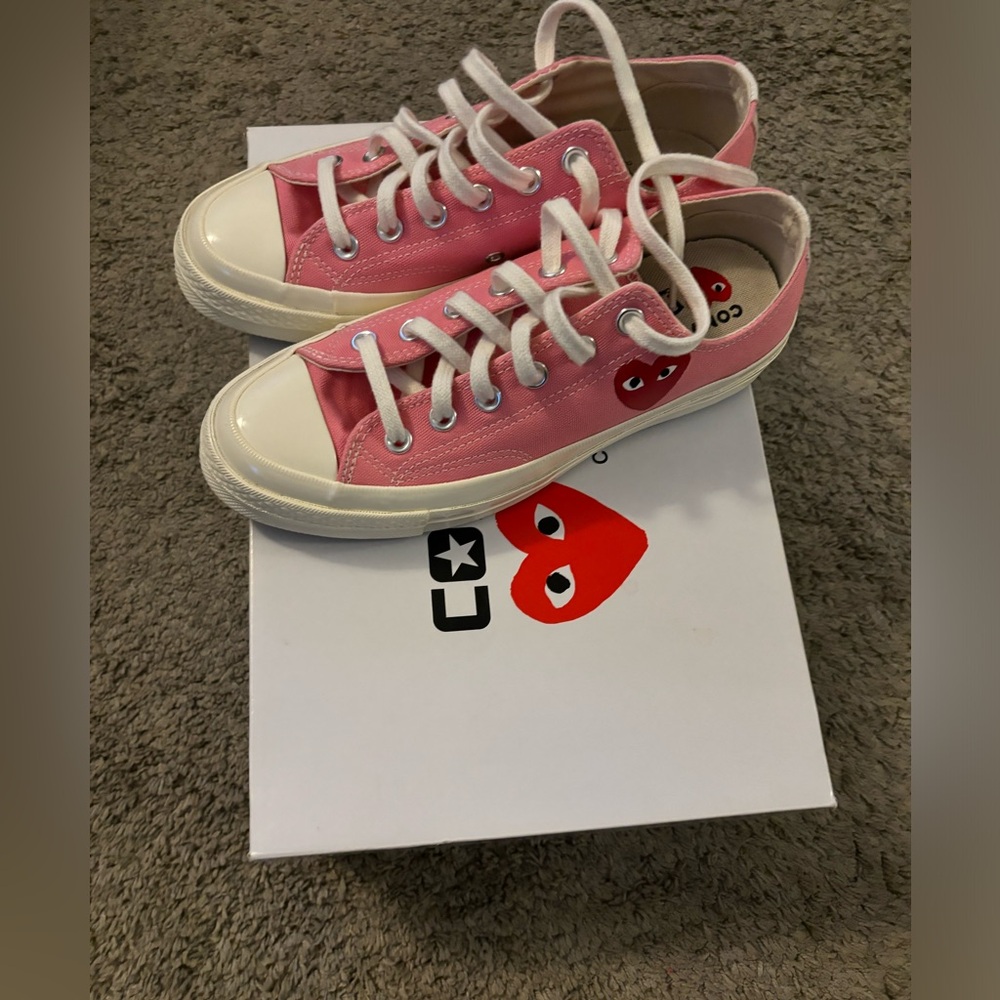 These are Converse by Commes des GARCONS in good condition..